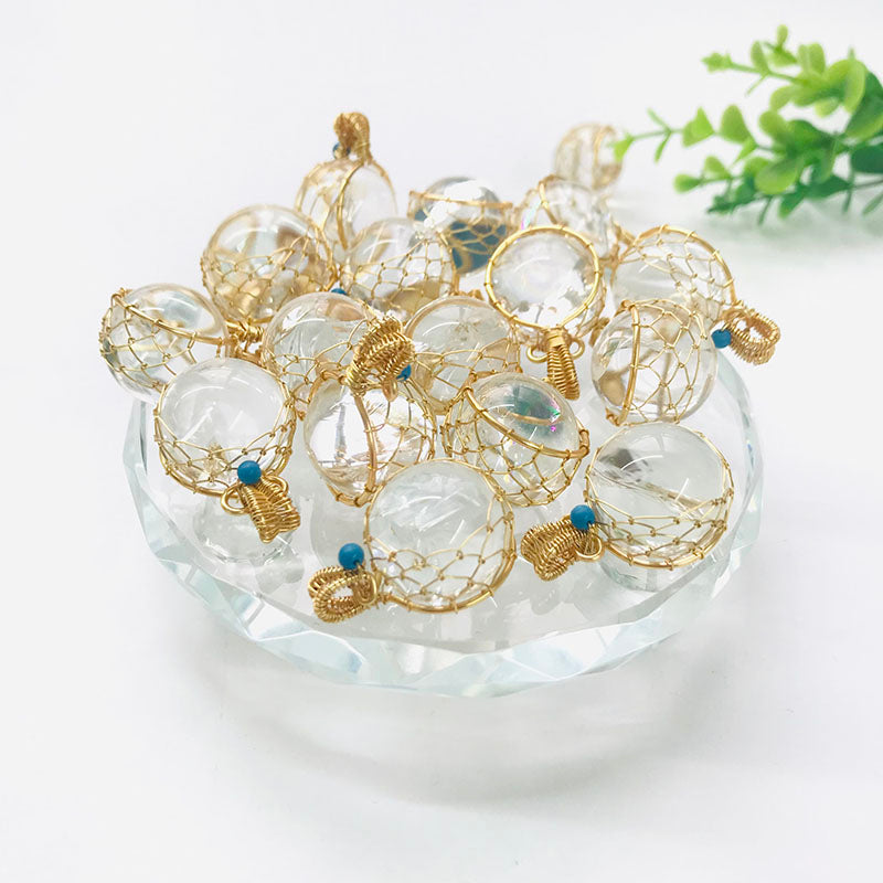 Metal Wrapped Clear Quartz Pendants