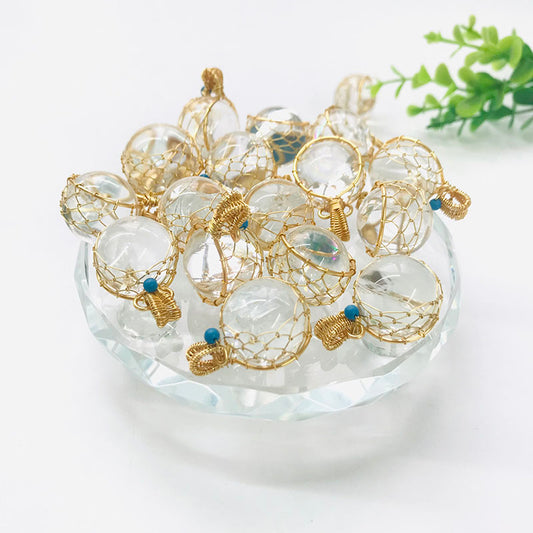 Metal Wrapped Clear Quartz Pendants